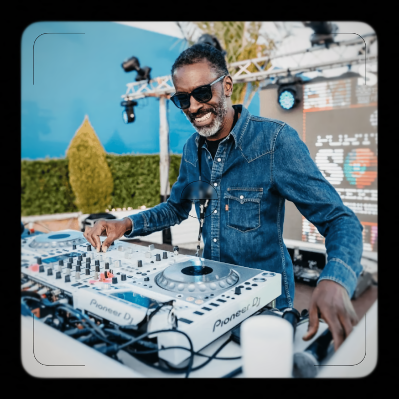 Jon Jules performing a soulful house DJ set at an outdoor Soul Fiesta event.