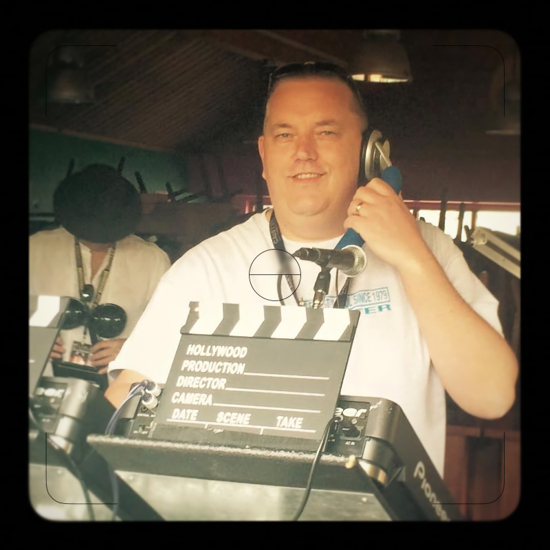 DJ Lee Alder behind the decks at a vintage soul and funk party.