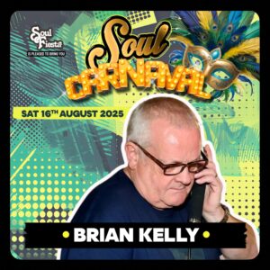 DJ Brian Kelly deep in concentration behind the decks, bringing rare groove and deep crates to the Soul Fiesta stage in Essex this August.